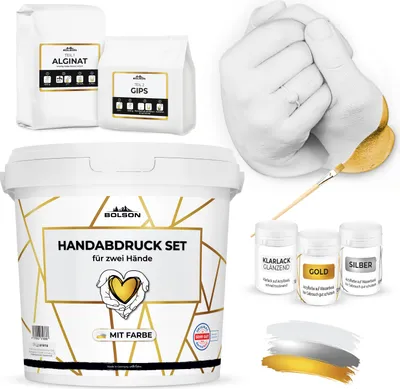 A collage of items for a handprint casting kit, including bags of alginate and plaster, a bucket with the product name, and small containers of paint and varnish.
