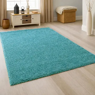 Obrázok produktu pre Moderný koberec s vysokým vlasom v odtieni aqua-tyrkys – štýlový dizajn a príjemný na dotyk Rozmery – 120 x 170 cm