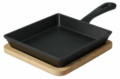 Immagine prodotto di HowHomely | Padella da portata - Ciotola per tapas - Padella per tapas - In ghisa - 24 x 14 cm - Set per tapas con sottopiatto in bambù - Pratico