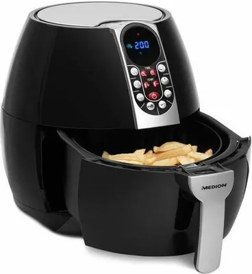 A black air fryer with a digital display and a basket filled with french fries.