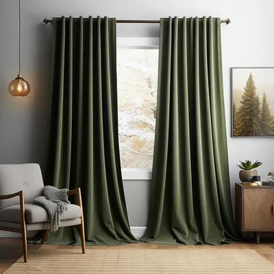 A living room scene with curtains, a chair, and a cabinet.