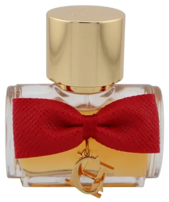 CH HC Privée Flakon mit goldener Kappe, roter Schleife und goldfarbenem CH-Anhänger, gefüllt mit goldenem Eau de Parfum.