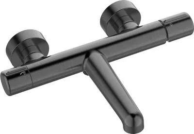 A close-up studio shot of a graphite-colored wall-mounted bathtub faucet.