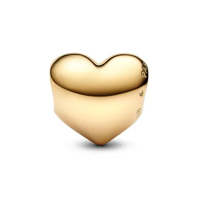 A gold heart-shaped charm on a white background.
