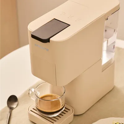 Produktbild von THERA STUDIO - Mehrkapsel-Express-Kaffeemaschine und gemahlener Kaffee