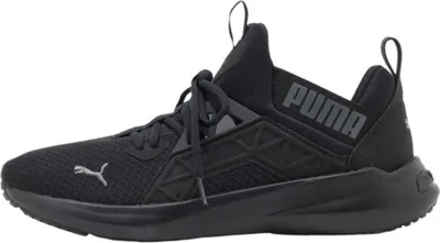 A black Puma sneaker shown from the side.