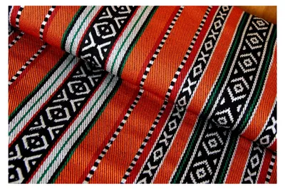 Produktbild von Dekostoff Meterware Ethno - robuster Jacquard in Orange - Stoff für Kostüme und Ponchos - stabiles Mischgewebe für Polsterungen *ab 50 cm