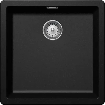 A top-down view of a black kitchen sink with a silver drain.