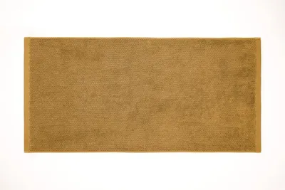 Productafbeelding van Heckettlane badhanddoek, 100% katoen, kleur: ochergel, afmetingen: 70x140 cm, verpakking: 1 stuk
