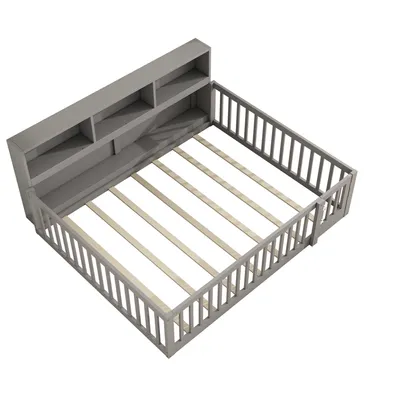 A gray bed frame with a bookshelf headboard and slatted mattress support, shown from a high angle.
