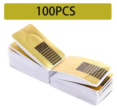 Immagine prodotto di Adesivi per sagome delle unghie - Sagome per unghie - 100 pezzi - Modelli in carta - Adatti per acrilico e gel UV - Per l'allungamento delle unghie - Colore oro