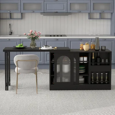 A modern kitchen with blue cabinets and a black kitchen island with a chair.
