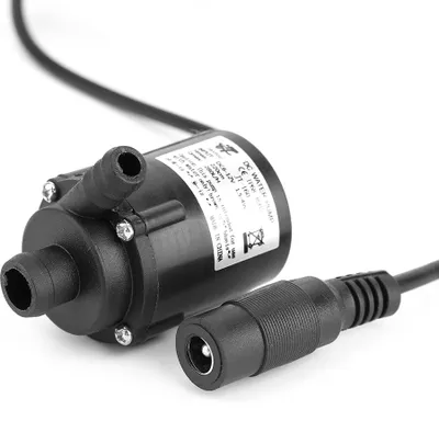 A black DC water pump with a connected power cable and plug, shown against a white background.