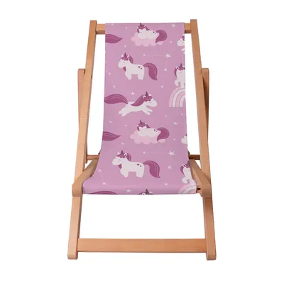 A wooden deck chair with a pink fabric featuring a unicorn and cloud pattern.