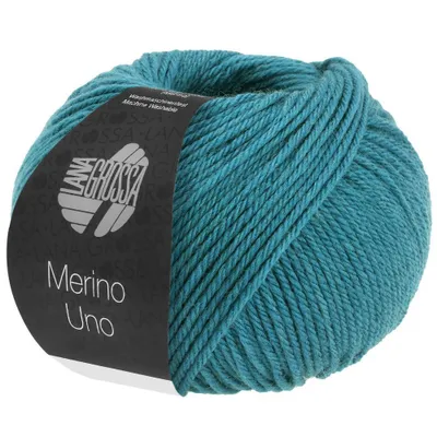 A ball of teal yarn with a label.