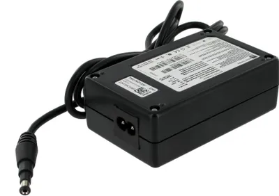 A black power adapter with cables and labels.