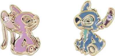 Two cartoon characters, Stitch and Angel, are shown as gold-colored enamel pins with gem accents.