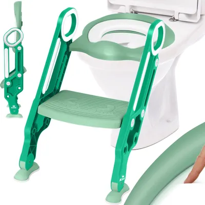 A green and white child's toilet training seat with a step stool attached, placed in front of a toilet.