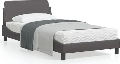 A bed with bedding is shown against a white background.