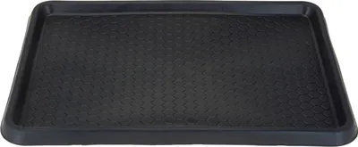 A black trunk mat with a textured surface.
