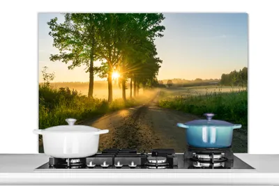 Obrázok produktu pre MuchoWow® Splashback Kuchyňa - Kuchynský backsplash - Ochrana steny pre sporák a drez Východ slnka cez stromy 100x65cm Alu-Dibond (alternatíva k