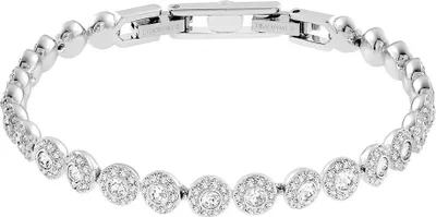 A close-up studio shot of a silver bracelet with clear crystals.