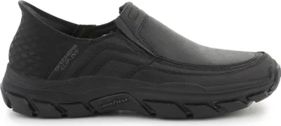 A black Skechers slip-on shoe is shown from the side against a white background.