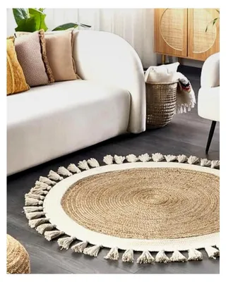 Produktbild von Teppich aus Rinderfell mit Fransen Jute ⌀ 120 cm beige