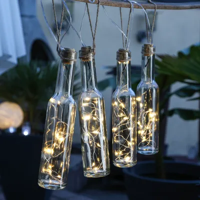 Produktbild von HI Solar Lichterkette für 4 Flaschen, Transparent, Glas-Kunststoff, Flasche 4,8x24,5cm (BxH), 12 LEDs pro Flasche, Außenbereich