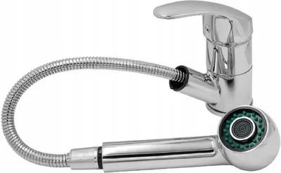 A chrome kitchen faucet with a pull-out spray head is shown against a white background.