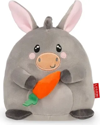 A plush toy donkey holding a carrot.