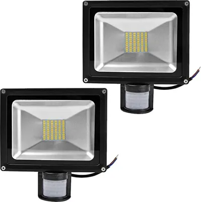 Two identical LED floodlights with motion sensors are shown against a white background.