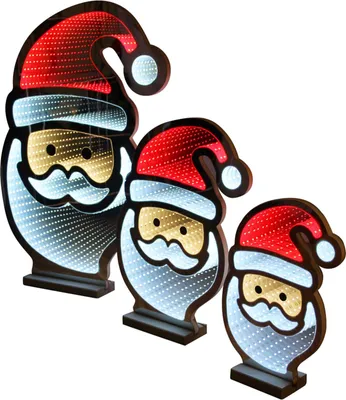 Three illuminated Santa Claus figures of varying sizes.