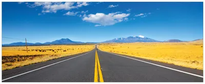 Produktbild von Wallario Premium Glasbild, freischwebende Optik, kräftige Farben, Größe 125 x 50 cm Motiv Route 89 in Arizona - Am Ende der Horizont