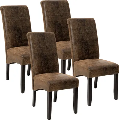 Four brown dining chairs are arranged in a group against a white background.