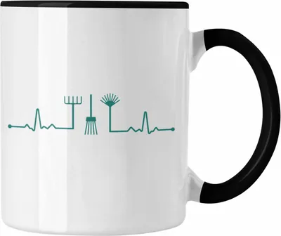 Produktbild von Trendation - Herzschlag Gärtner Tasse mit Spruch Garten Hobbygärtner Geschenk Lustig Gärtnerin Geschenkidee (Schwarz)