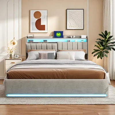 A modern bedroom with a large bed, nightstand, and artwork on the wall.