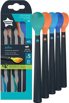A product shot of Tommee Tippee Softee weaning spoons in their packaging, with some spoons displayed outside the box.