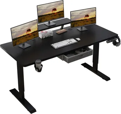 A black standing desk with three monitors, a keyboard, a mouse, and a cup holder.
