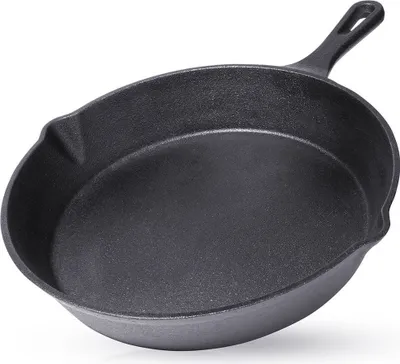 A black cast iron frying pan is shown from a slightly elevated angle against a white background.
