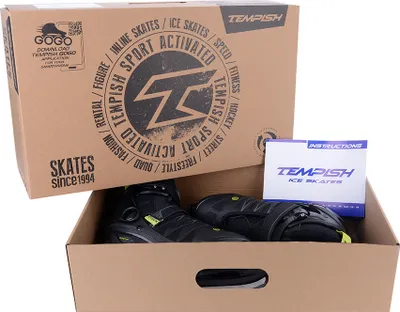 A pair of ice skates inside their original packaging box, with an instruction booklet placed next to them.