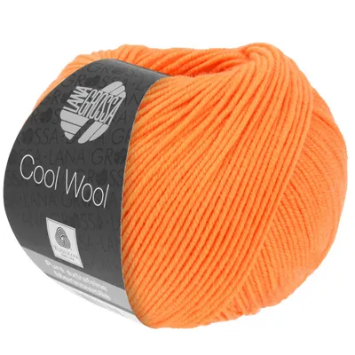 A ball of orange yarn with a label.