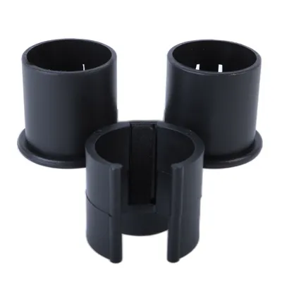 Three black plastic vacuum cleaner tube holders on a white background.