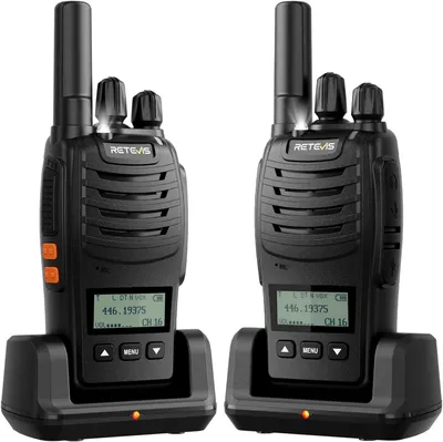 Two black walkie-talkies are shown in their charging docks against a white background.