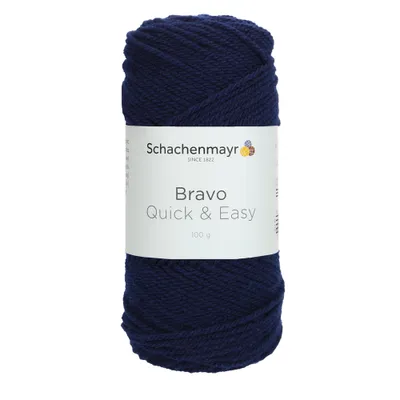 A ball of navy blue yarn with a label.