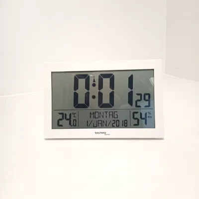 Immagine prodotto di Technoline WS 8016 Moderno orologio digitale radiocontrollato da parete con display della temperatura in plastica (29,99)