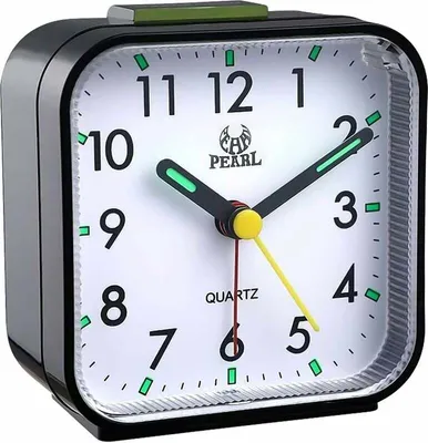A close-up view of a black analog alarm clock with a white face.