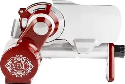 A side view of a red and silver electric slicer.