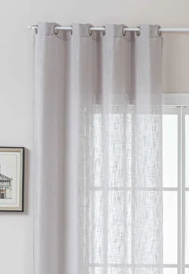 A close-up view of a gray, semi-transparent curtain with a linen-look texture, hanging from a white curtain rod.