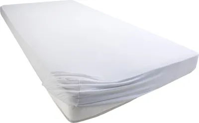 A white fitted sheet on a mattress, shown from a diagonal angle.